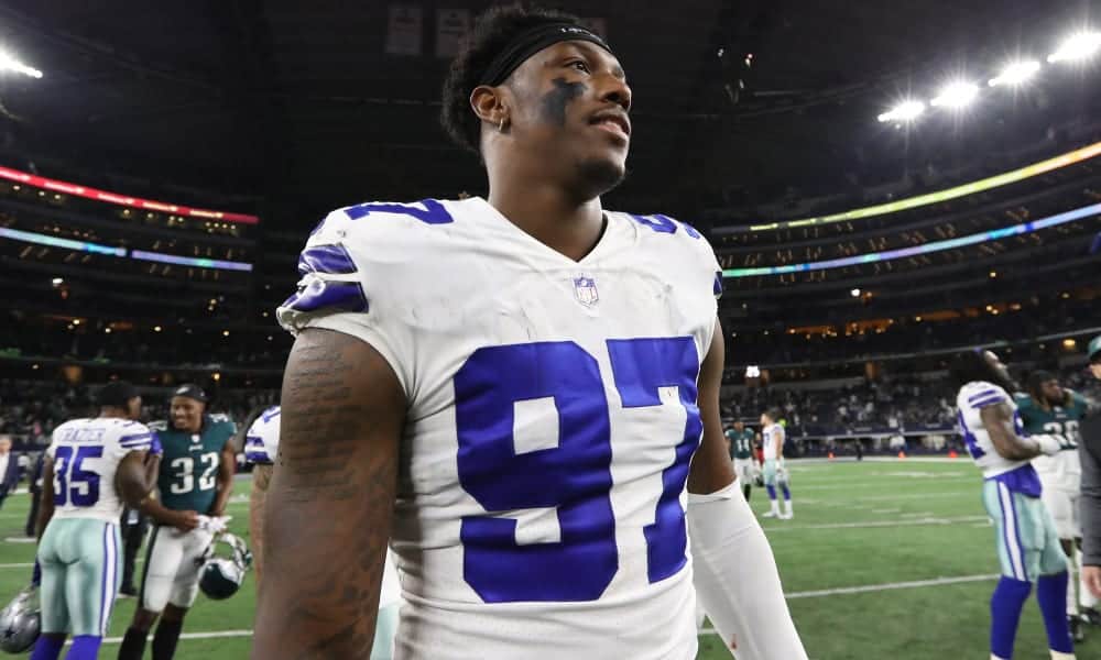 Dallas Cowboys defensive end Taco Charlton (97) walks off the