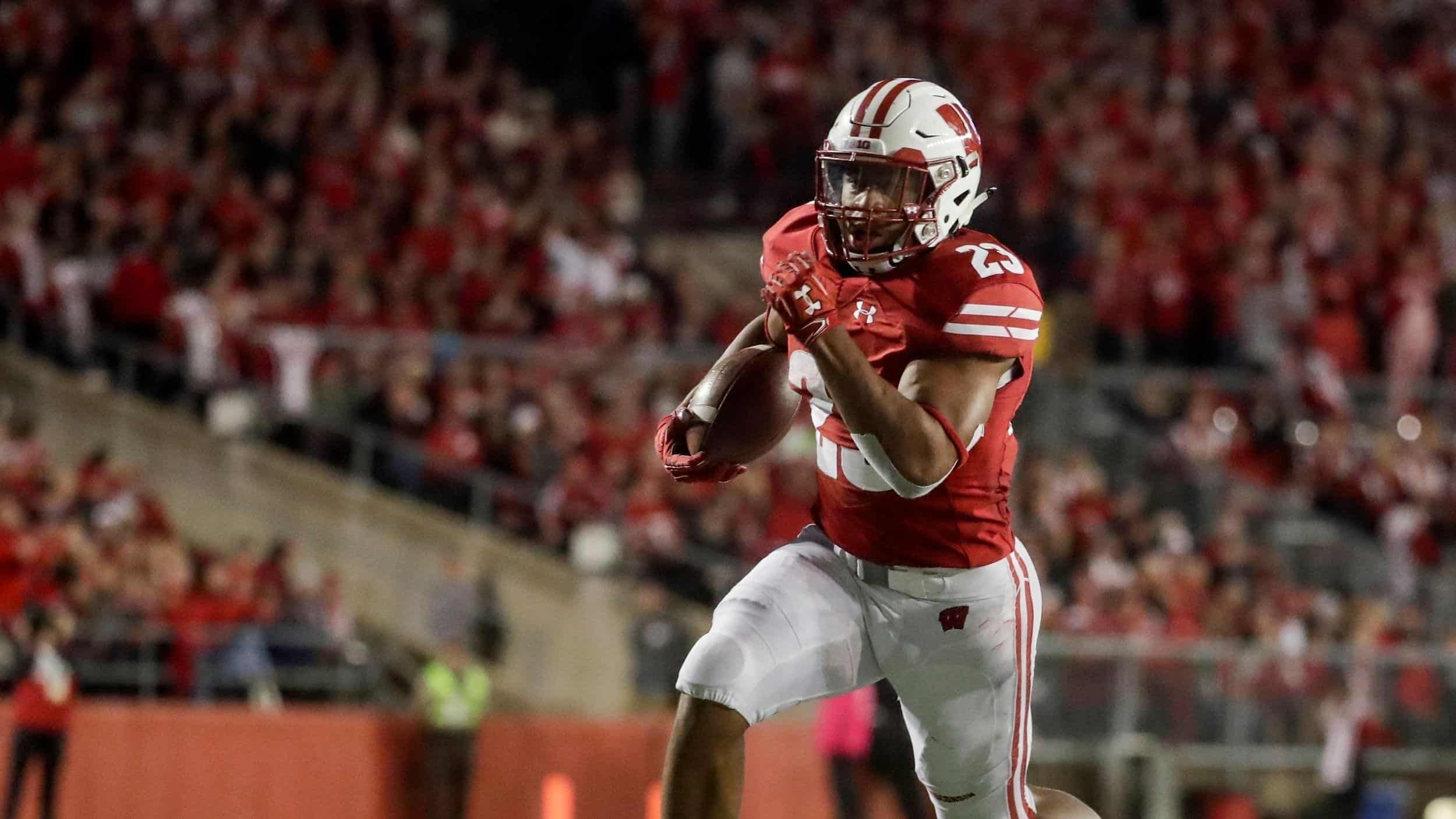 Wisconsin's Jonathan Taylor breaks Herschel Walker's record for