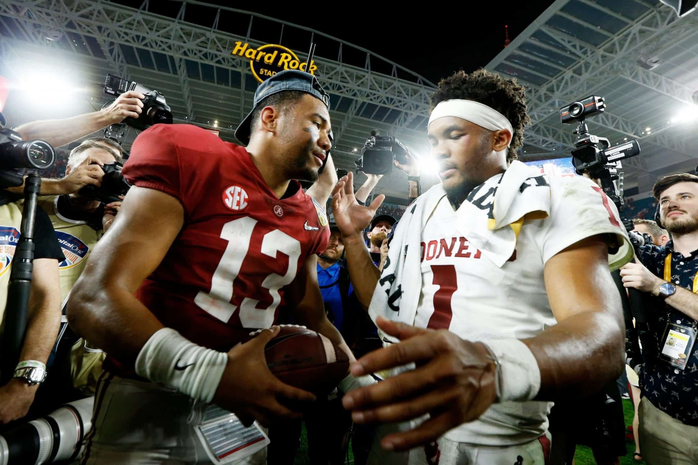 Download Tua Tagovailoa shines under the bright lights of the