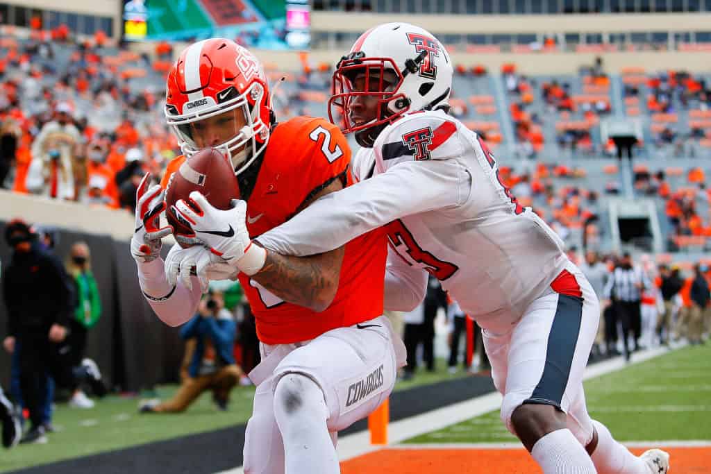 NFL Draft Stock Report Week 13: Oklahoma State WR Tylan Wallace headlines risers