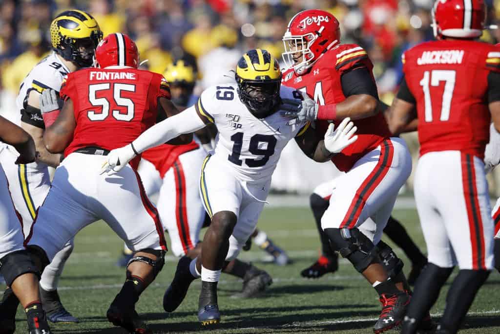 Michigan's Kwity Paye has career-best game but leaves with injury 