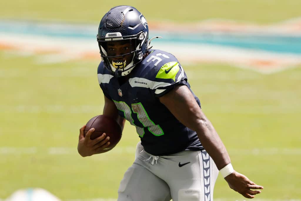 DeeJay Dallas injury update: How to handle the Seahawks RB vs. 49ers in  Week 15 - DraftKings Network