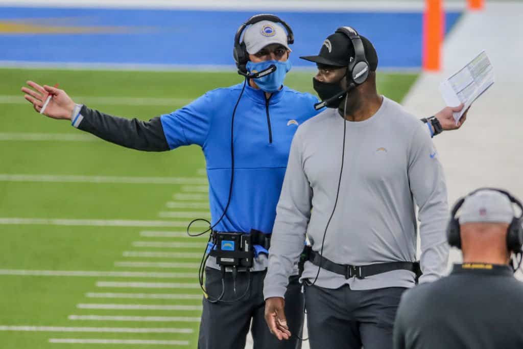 Los Angeles Chargers head coach Anthony Lynn wears a face shield and a Salute  to Service shirt on the field before the Los Angeles Chargers take on the  Miami Dolphins during an NFL football game, Sunday, Nov. 15, 2020, in Miami  Gardens, Fla. (AP