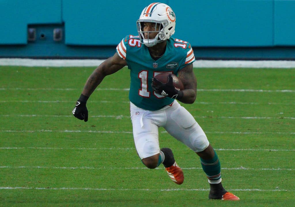 Miami Dolphins running back Lynn Bowden (15) runs the football during the  first half of an NFL …