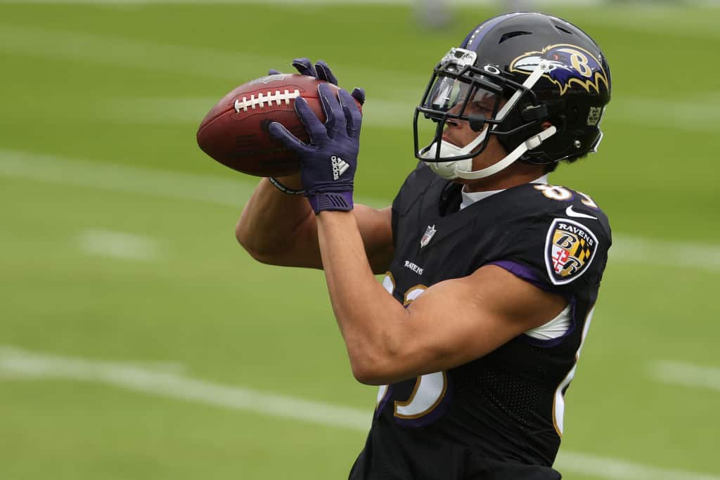 Baltimore Ravens wide receiver Willie Snead warms up while wearing