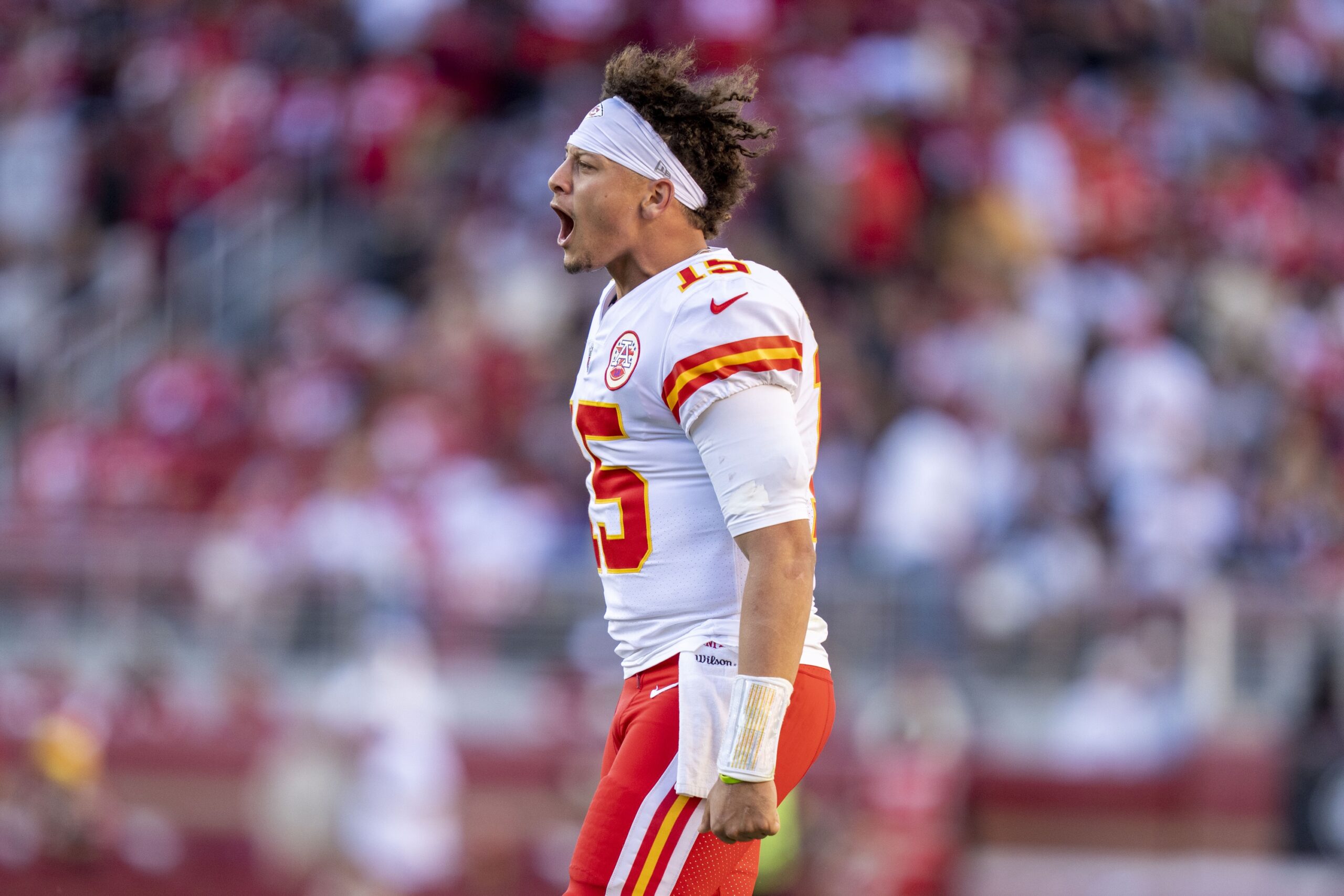 Patrick Mahomes (15) celebrates after a point-after-touchdown against the San Francisco 49ers during the fourth quarter at Levi's Stadium.