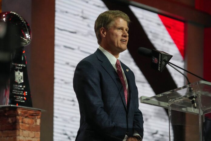 Kansas City Chiefs owner Clark Hunt announces the team's first-round pick at the 2023 NFL Draft.