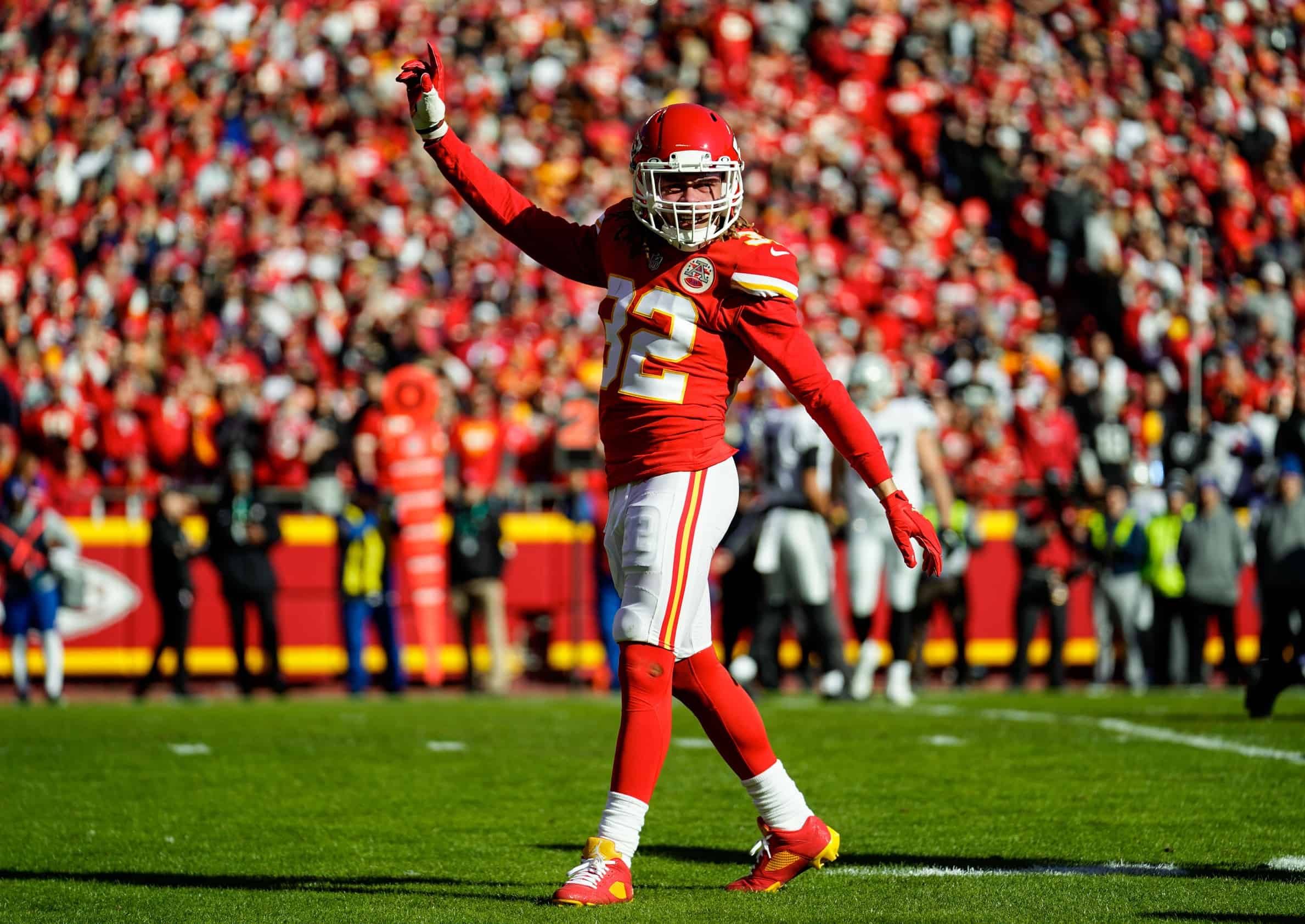 Kansas City Chiefs safety Tyrann Mathieu (32) interacts with a fan