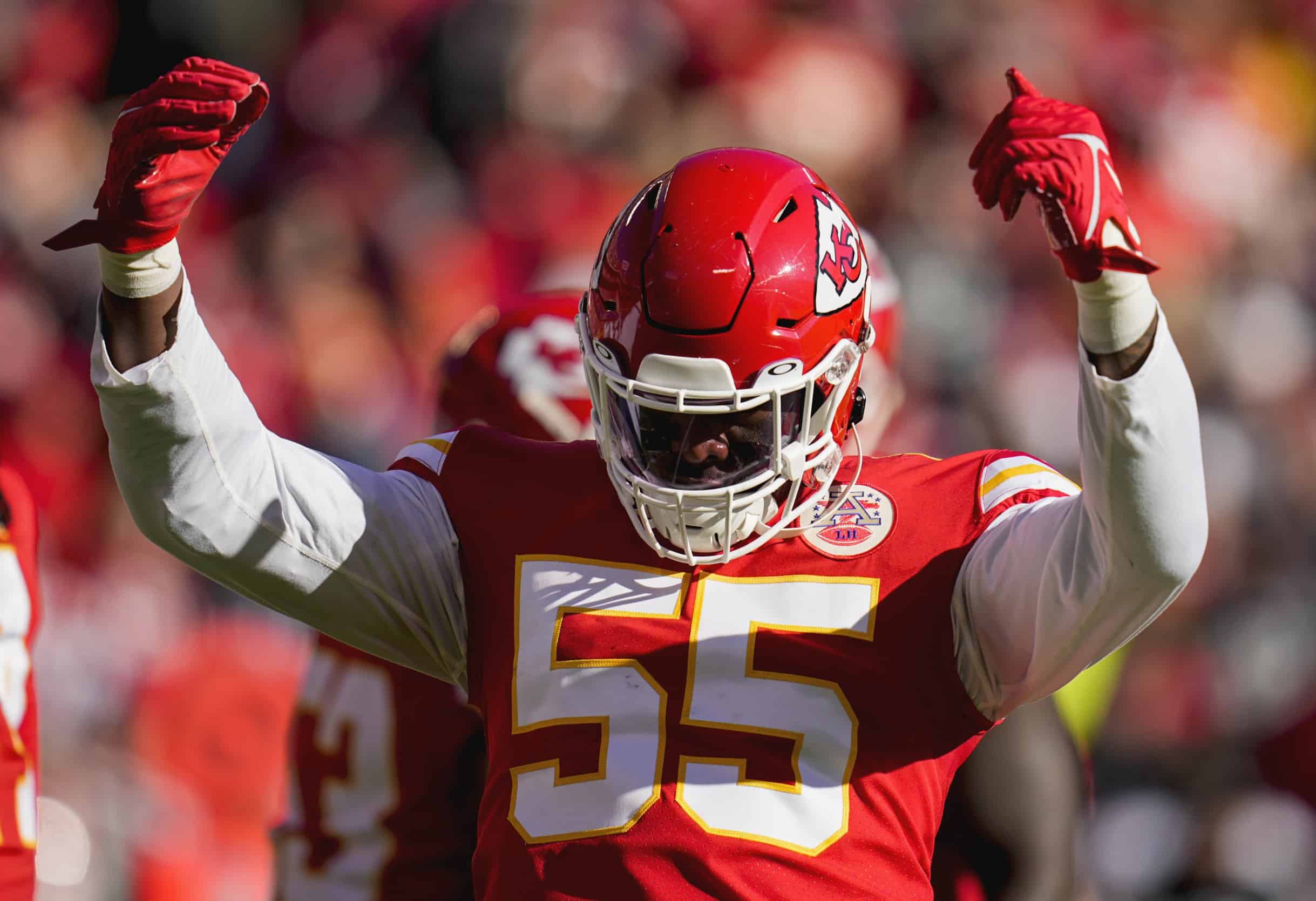 Kansas City Chiefs defensive end Frank Clark (55) rushes during a play  during an NFL football