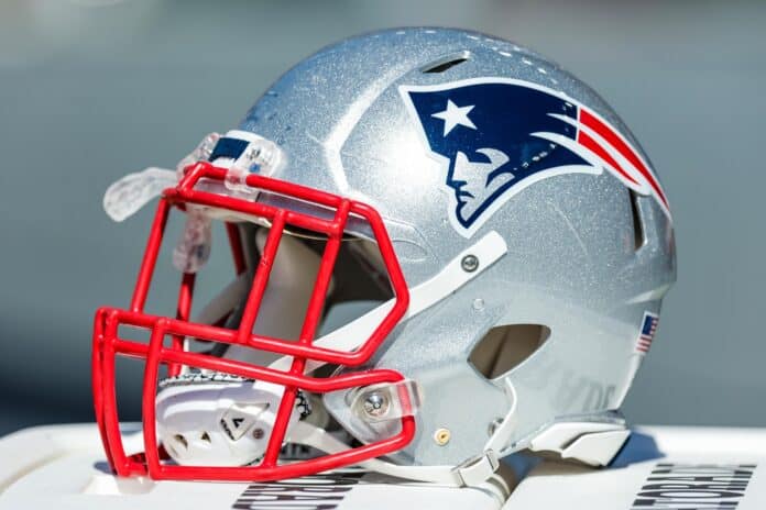 The New England Patriots helmet displayed on the team's bench.