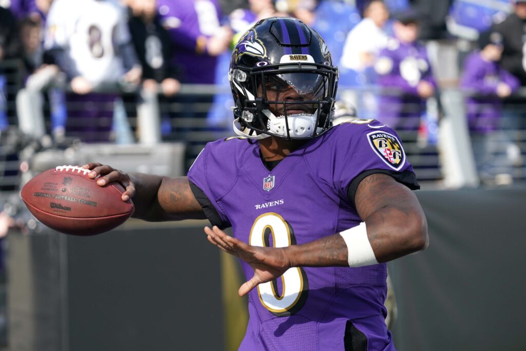 Baltimore Ravens quarterback Lamar Jackson (8) warms up before