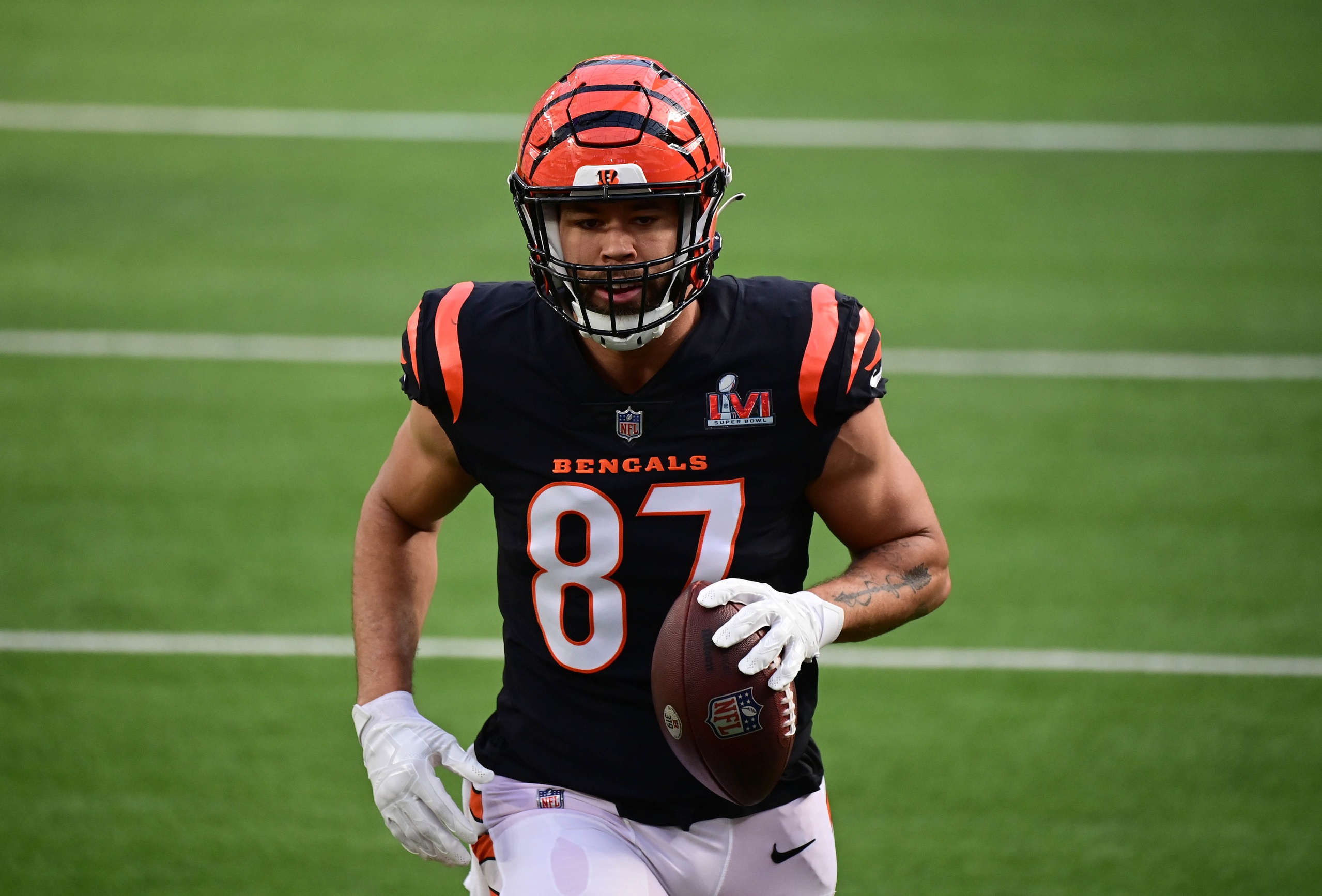 Cincinnati Bengals tight end C.J. Uzomah runs with the football