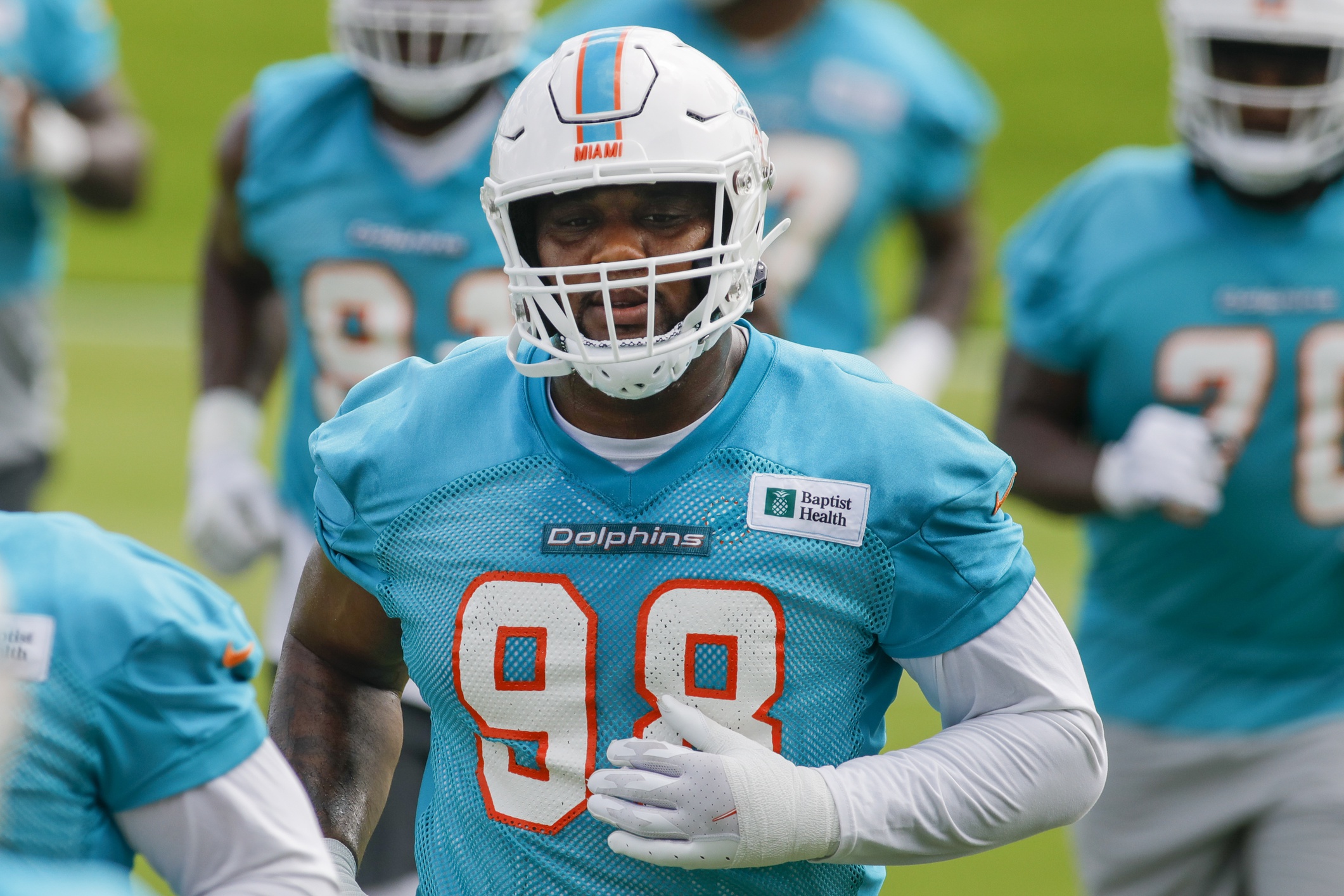 Miami Dolphins defensive tackle Raekwon Davis (98) lines up during