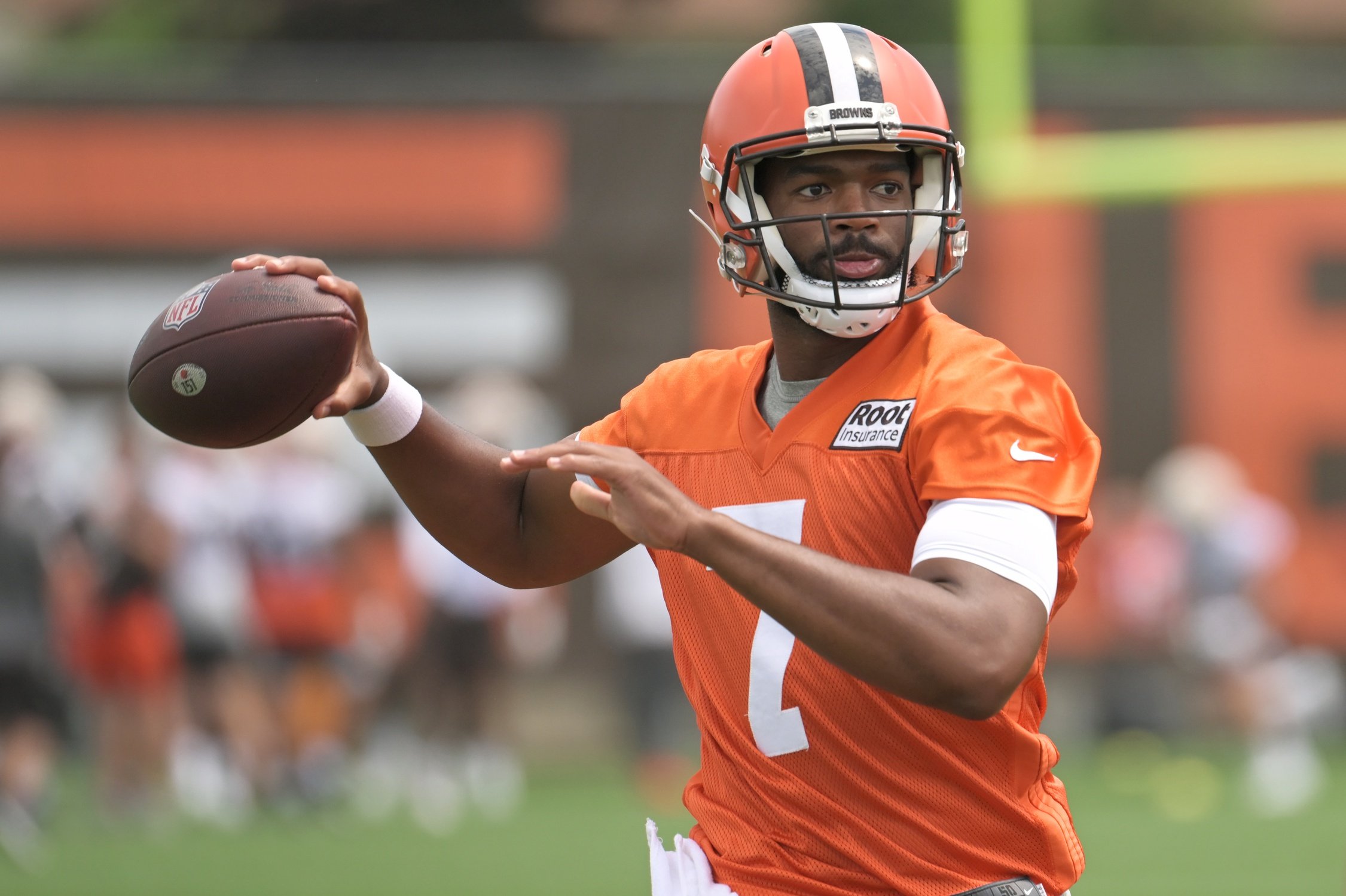 Cleveland Browns quarterback Jacoby Brissett (7) listens to a