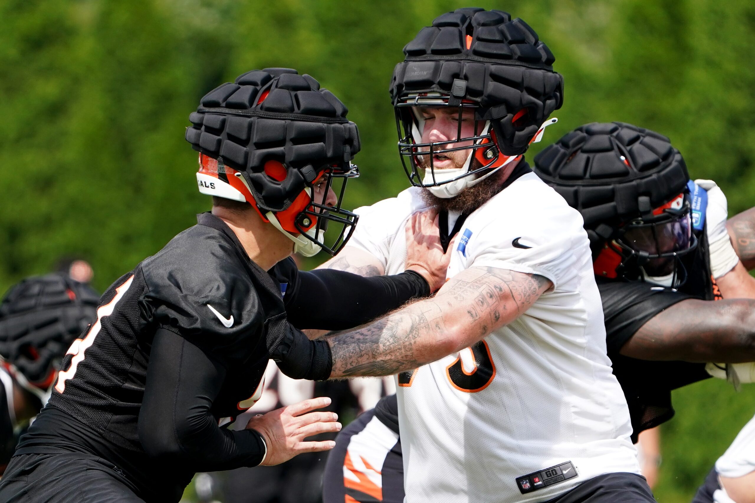 Cincinnati Bengals guard D'Ante Smith (70) looks to make a block