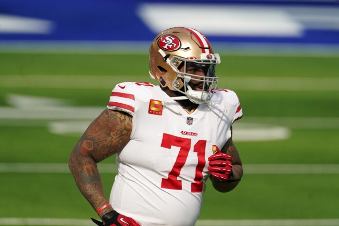 San Francisco 49ers center Jake Brendel (64) takes part in drills