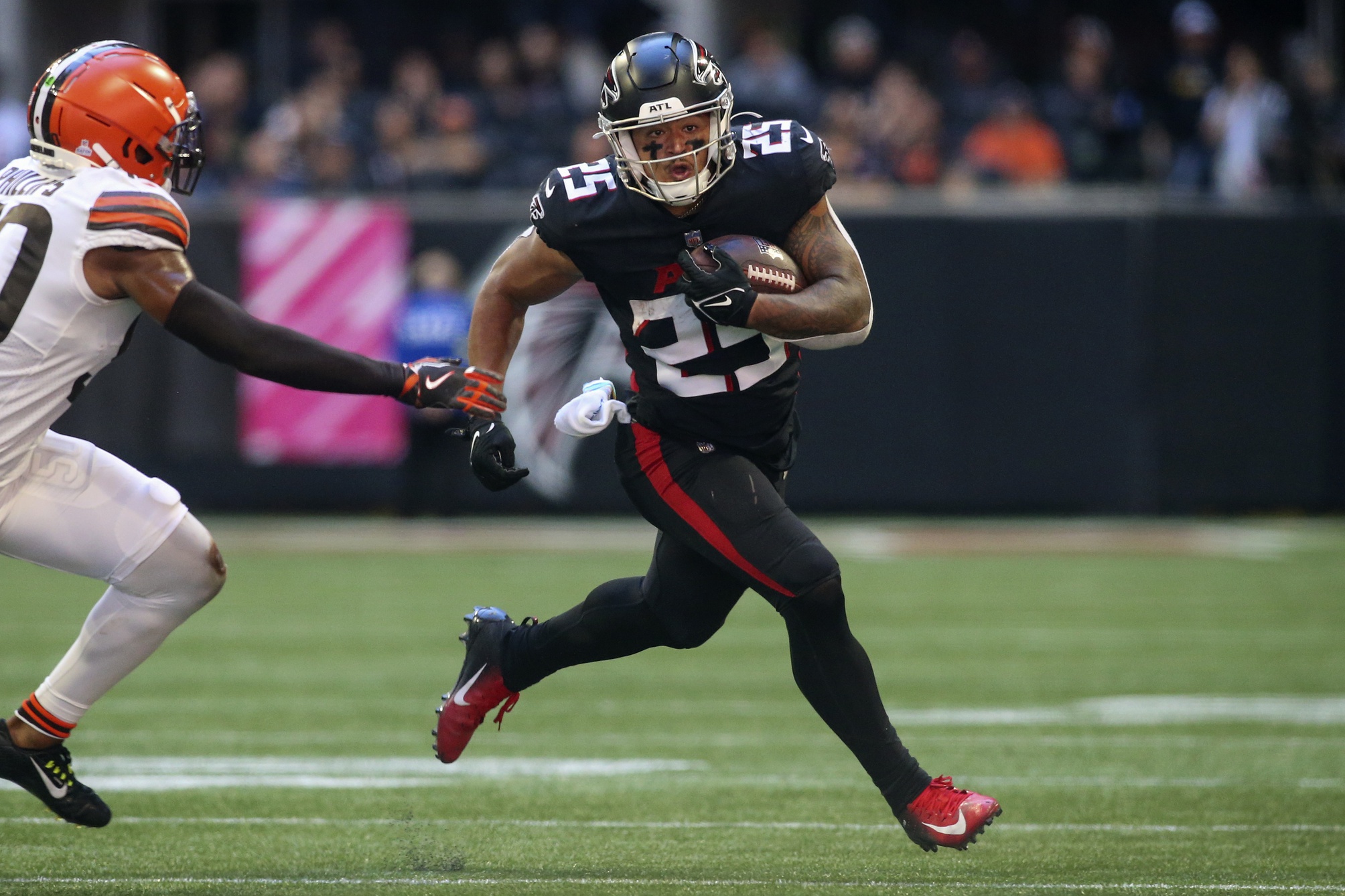 Tyler Allgeier of the Atlanta Falcons breaks loose for a touchdown