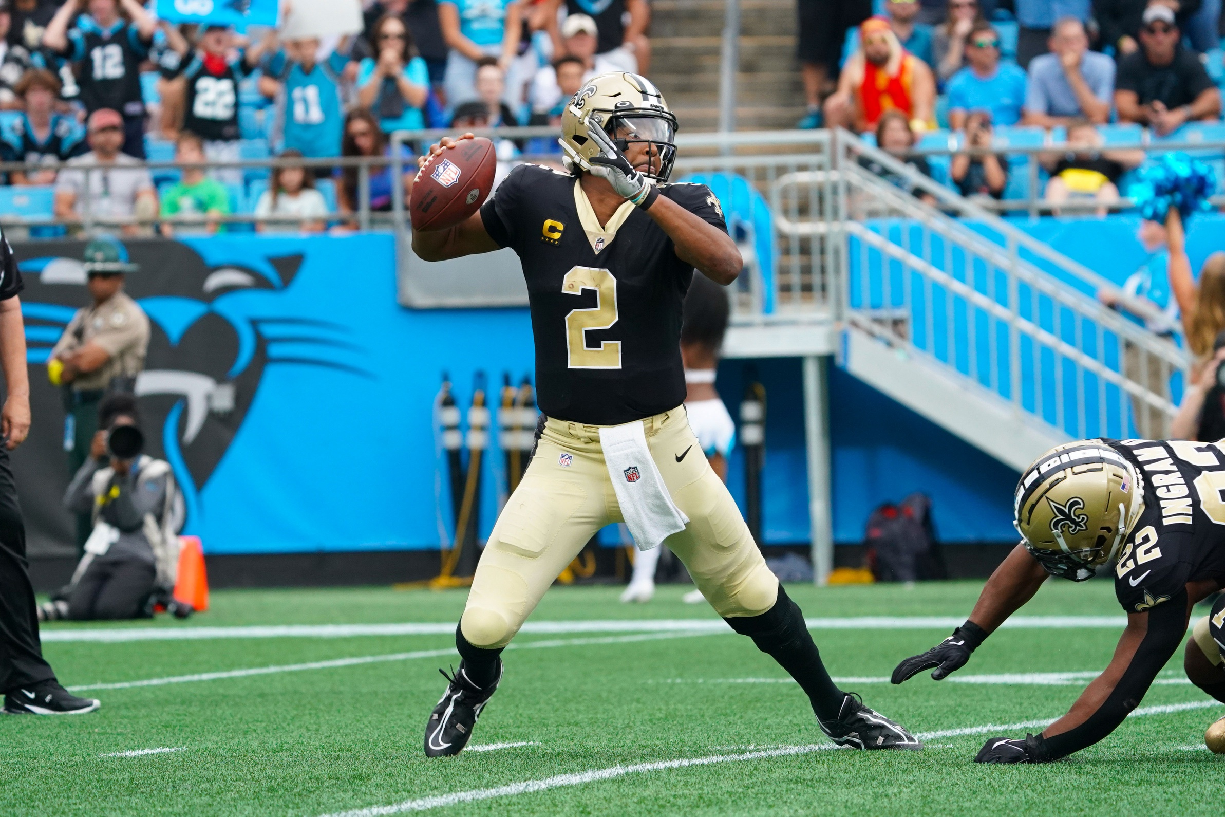 New Orleans Saints quarterback Jameis Winston (2) is flipped over