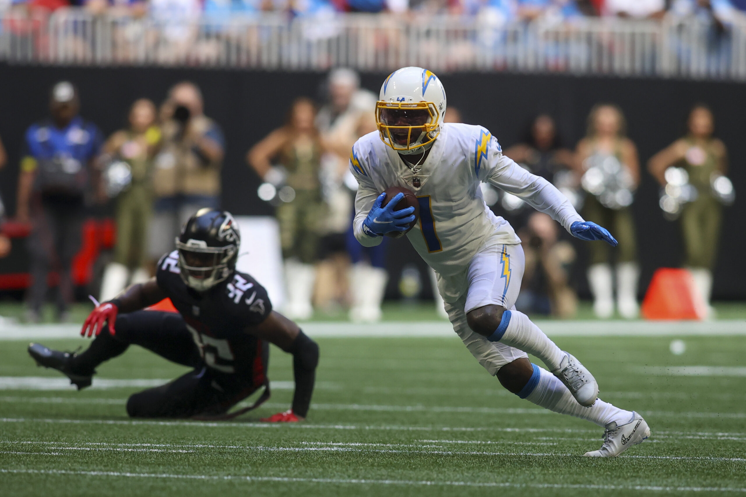 Los Angeles Chargers wide receiver DeAndre Carter (1) is stopped