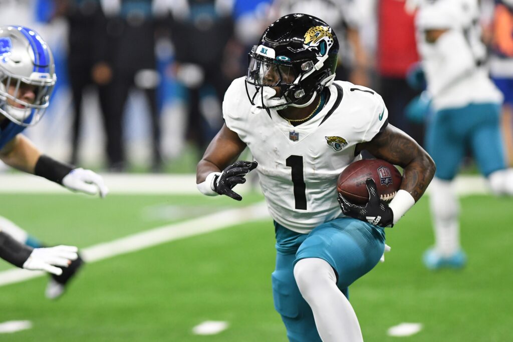 Travis Etienne fantasy football, DFS outlook: What to do with the Jaguars  RB in 2023 NFL Wild Card round - DraftKings Network