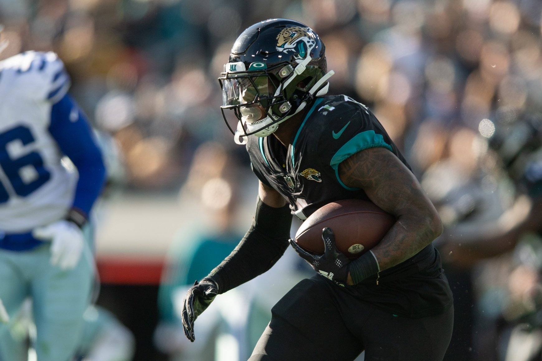 Jacksonville Jaguars running back Travis Etienne Jr. looks on