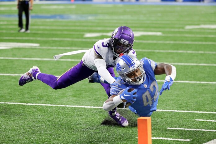 Vikings fail to lock up NFC North with 34-23 loss to Lions