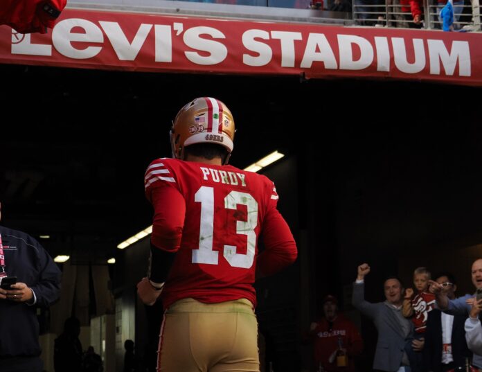 San Francisco 49ers QB and Mr. Irrelevant for 2022, Brock Purdy, jogs to the locker room.