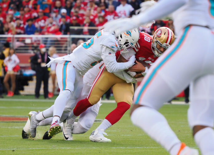 Brock Purdy steps up after Jimmy Garoppolo leaves injured in 49ers' win  over Dolphins