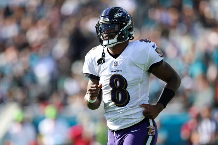 Lamar Jackson runs to the sidelines against the Jaguars.