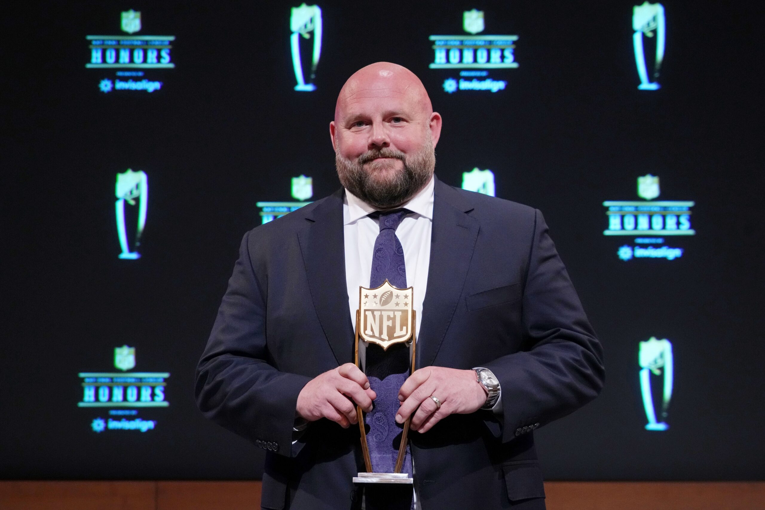 Brian Daboll poses for a photo after receiving the award for AP Coach of the Year during the NFL Honors award show at Symphony Hall.