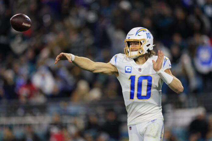 Quarterback Justin Herbert of the Los Angeles Chargers looks to