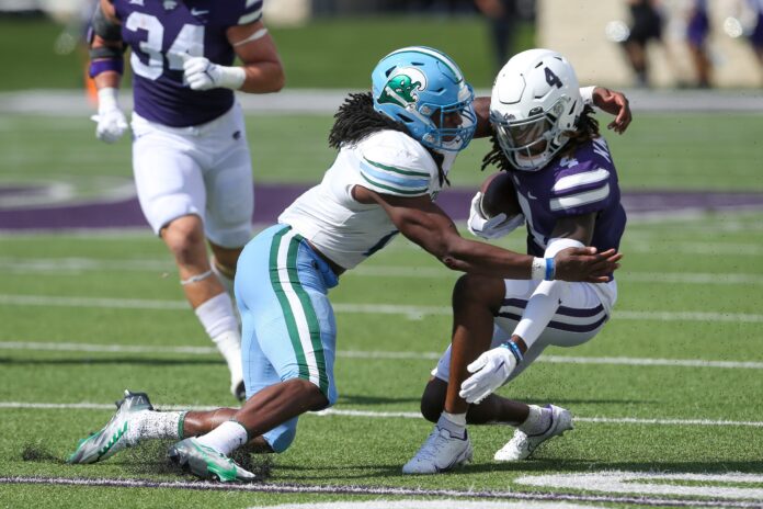 Kansas State Wildcats wide receiver Malik Knowles is tackled by Tulane Green Wave linebacker Dorian Williams during the third quarter.