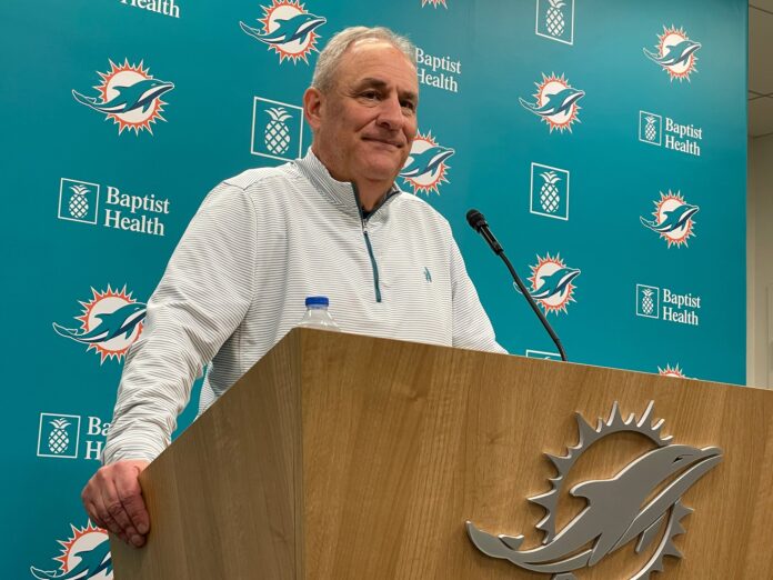 Miami Dolphins defensive coordinator Vic Fangio speaks and takes questions at a press conference.