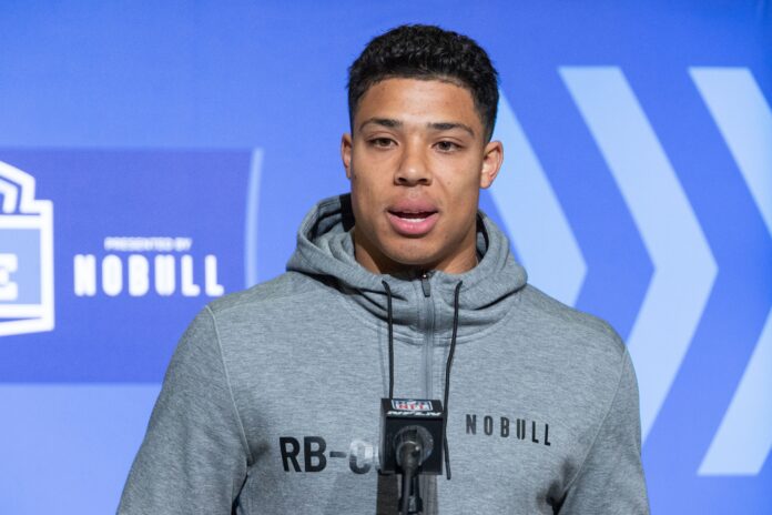 Zach Charbonnet speaks to the press at the NFL Combine.