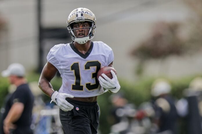 New Orleans Saints WR Michael Thomas (13) runs with the ball during practice.