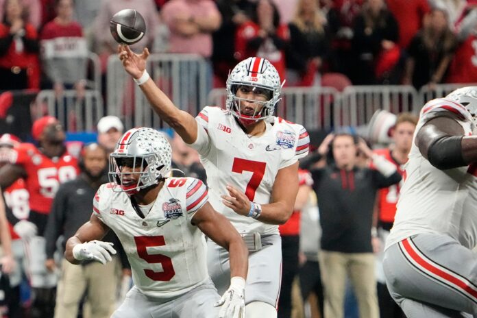 Ohio State QB C.J. Stroud (7) throws a pass during the CFP semifinal.