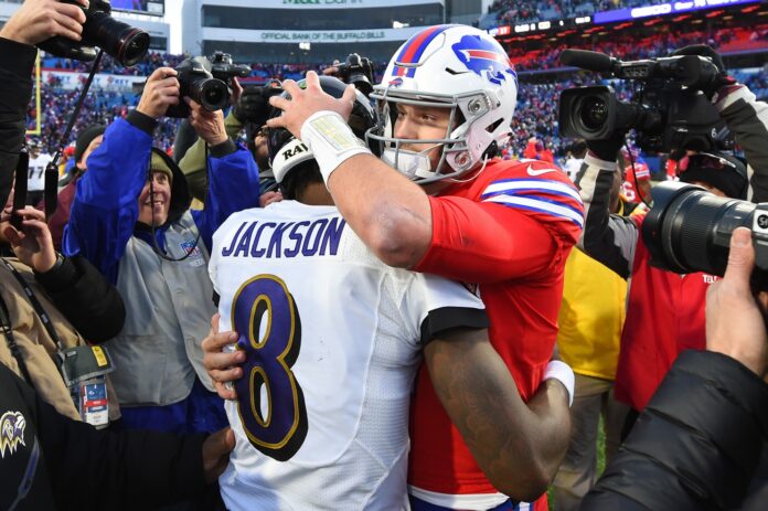 Baltimore Ravens quarterback Lamar Jackson (8) and Buffalo Bills quarterback Josh Allen (17) embrace following the game at New Era Field.