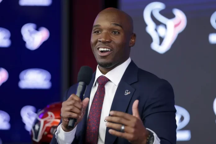 DeMeco Ryans answers questions at NRG Stadium.