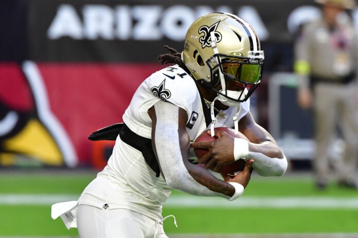 Alvin Kamara warms up prior to the game against the Arizona Cardinals.