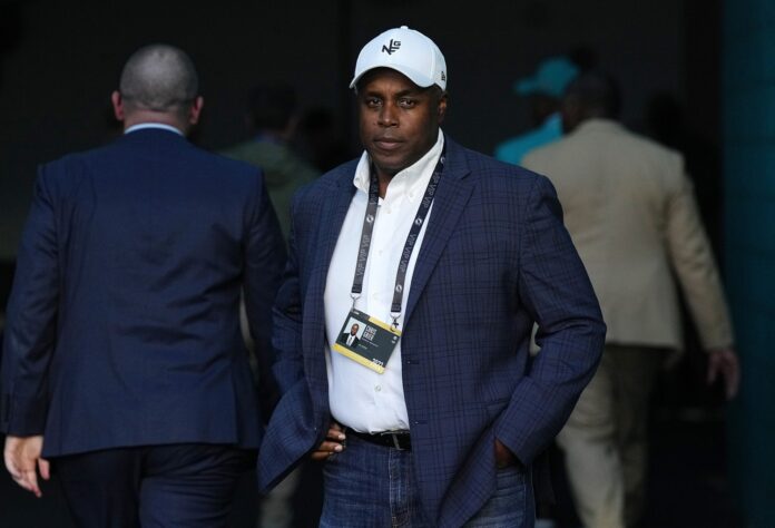 Miami Dolphins GM Chris Grier observing his team at Hard Rock Stadium.