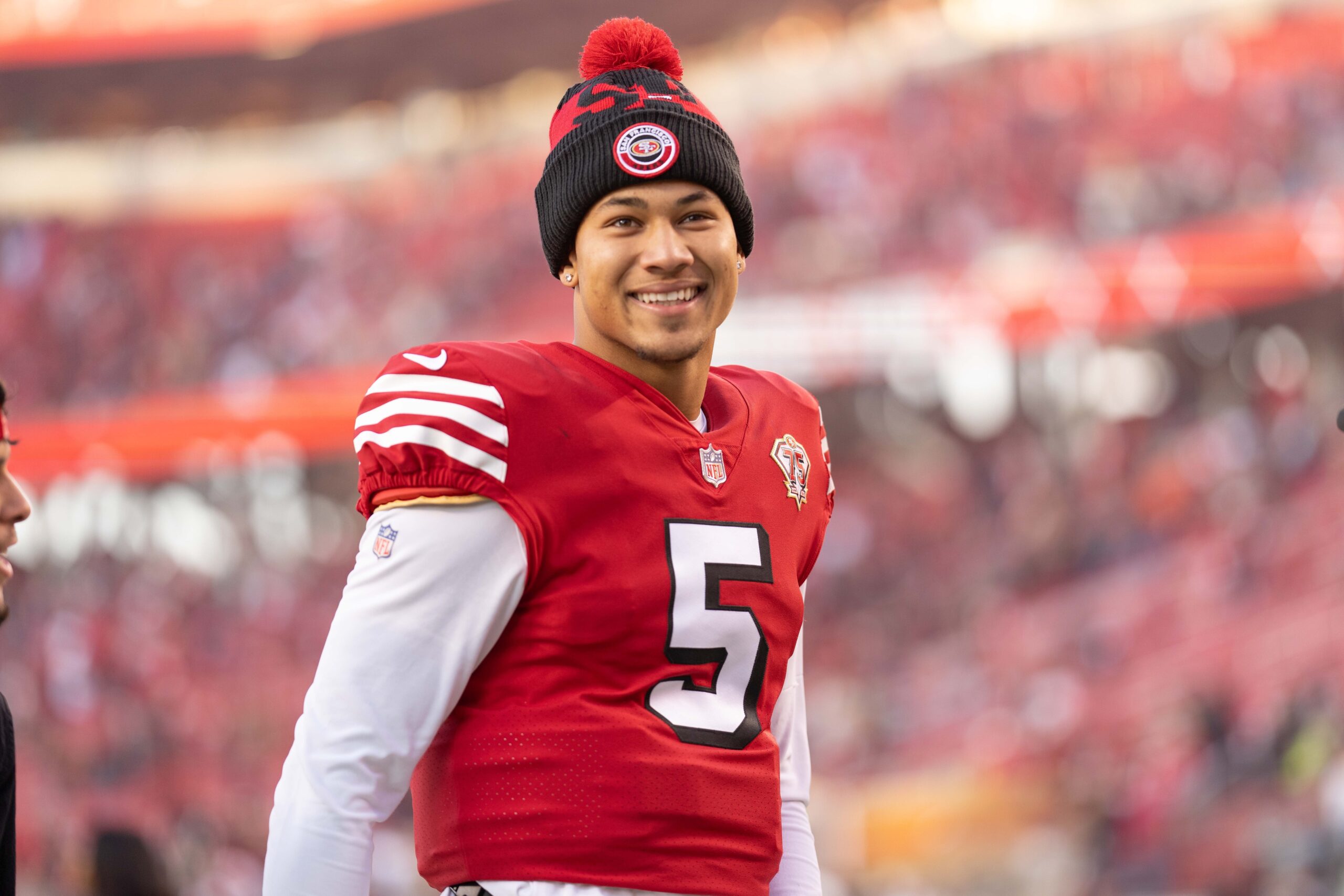 Trey Lance (5) smiles after defeating the Atlanta Falcons at Levi's Stadium.