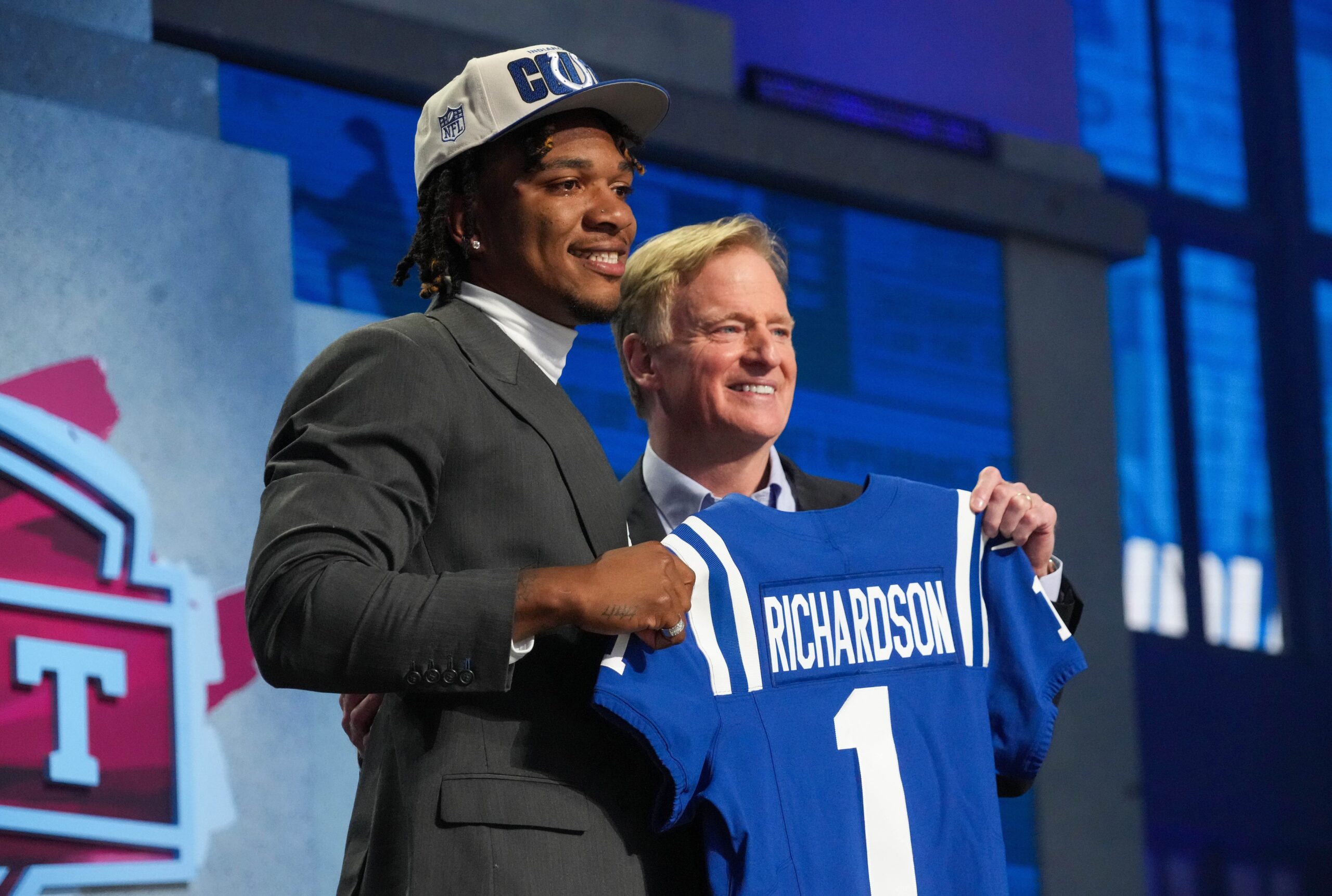 Quarterback Anthony Richardson poses with NFL Commissioner Roger Goodell after being selected by the Indianapolis Colts.