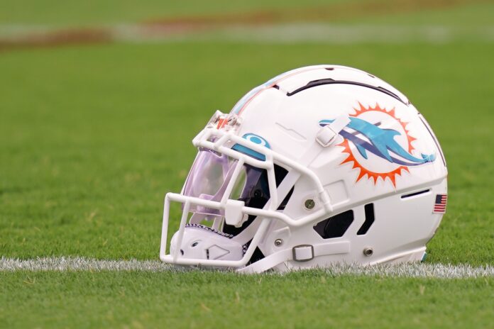 A general view of a Miami Dolphins helmet on the field during training camp at Baptist Health Training Complex.