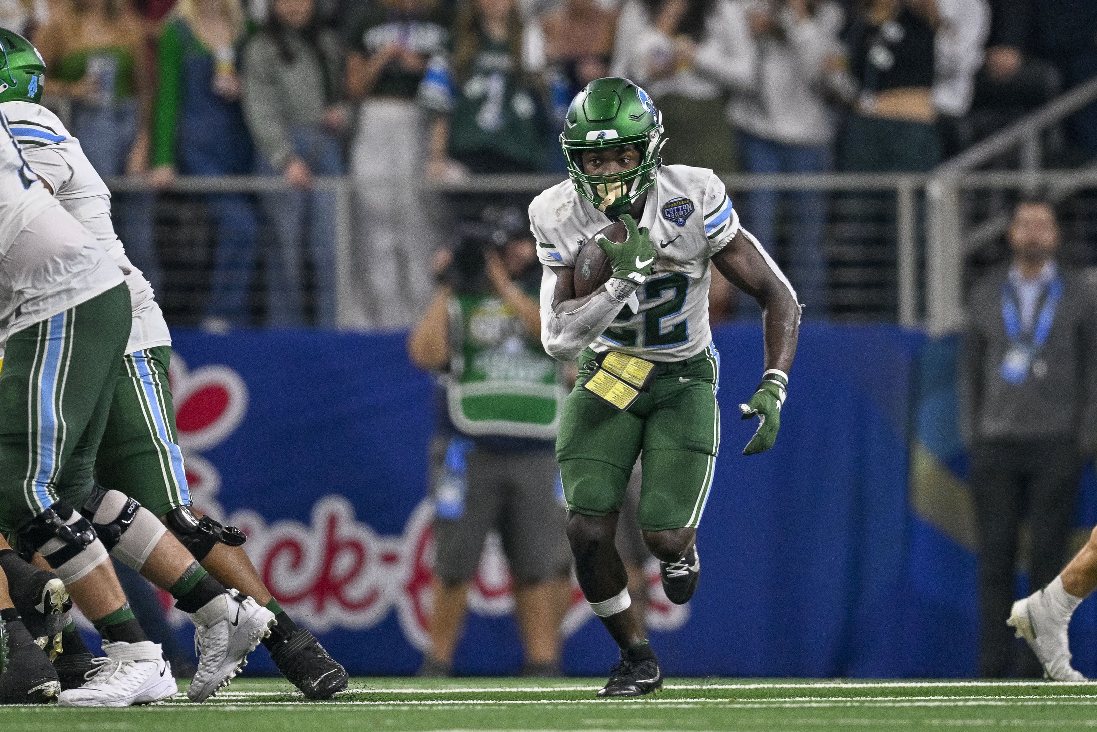 Tulane Green Wave running back Tyjae Spears (22) runs with the ball.