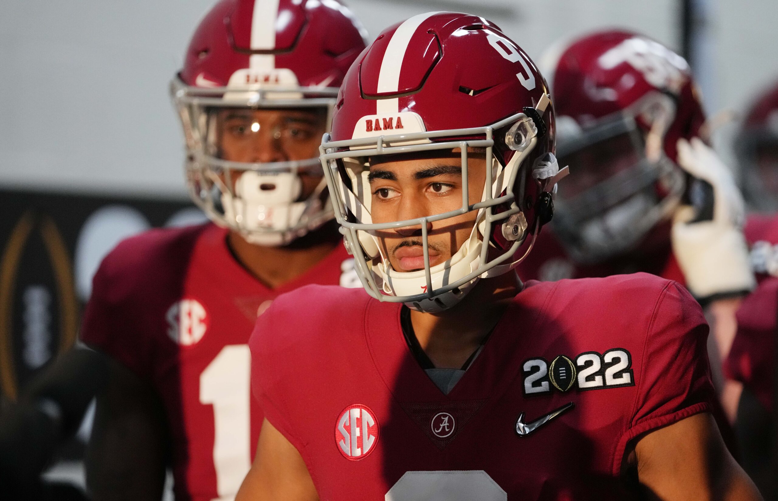 Alabama QB Bryce Young coming out of the tunnel with his teammates.