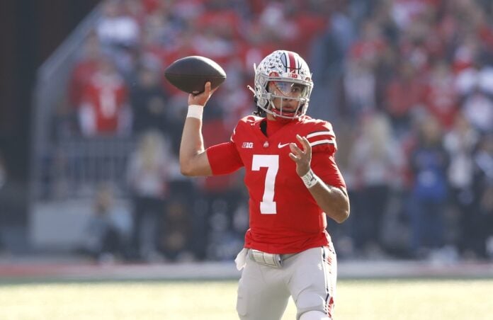 Ohio State Buckeyes quarterback C.J. Stroud (7) drops to throw during the second quarter against the Michigan Wolverines at Ohio Stadium.