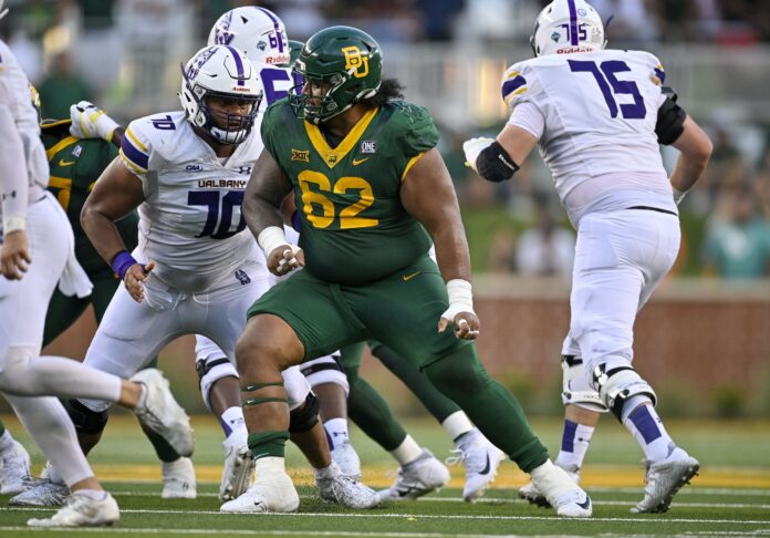 Siaki Ika (62) in action during the game between the Baylor Bears and the Albany Great Danes.