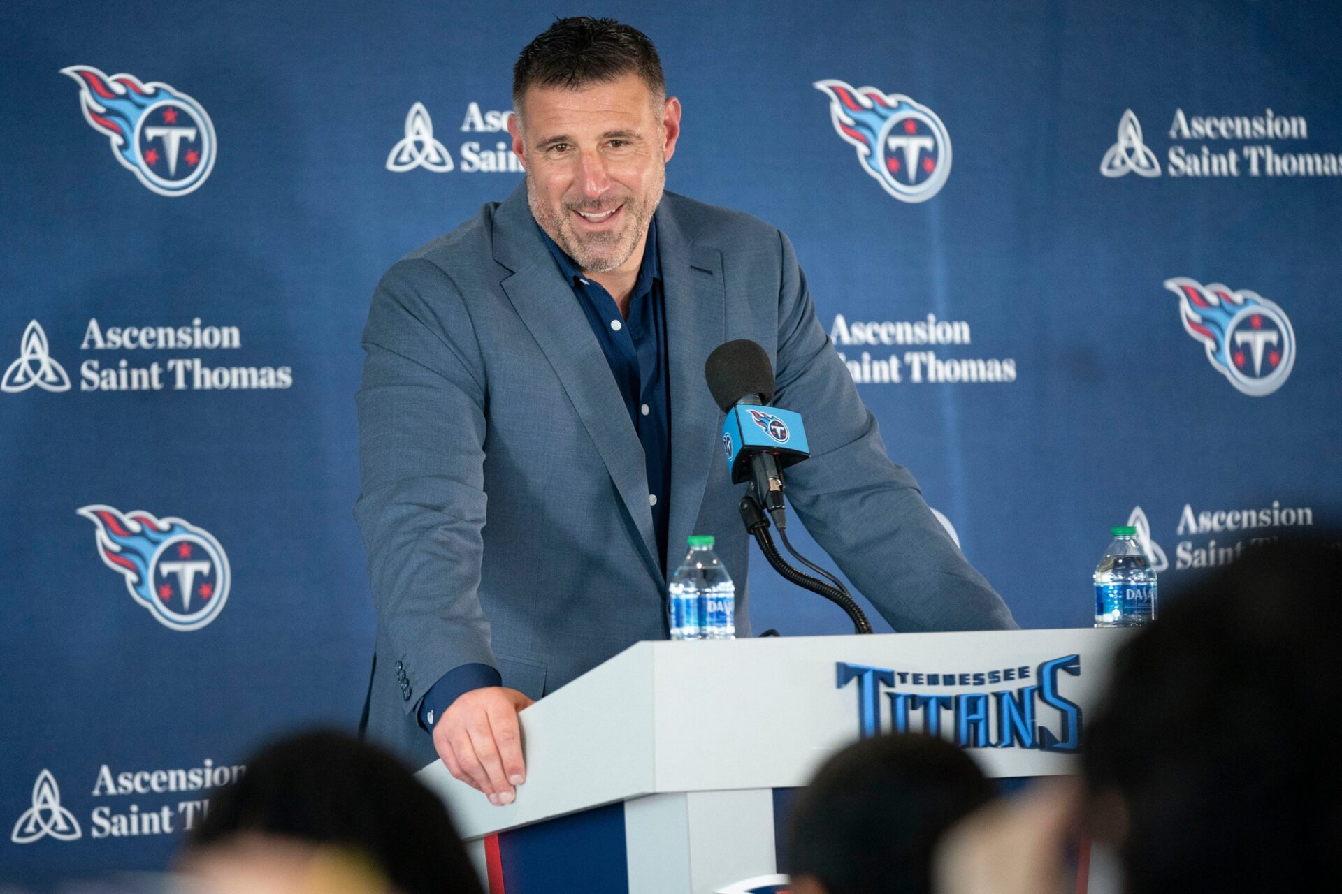 Mike Vrabel responds to questions during a press conference.
