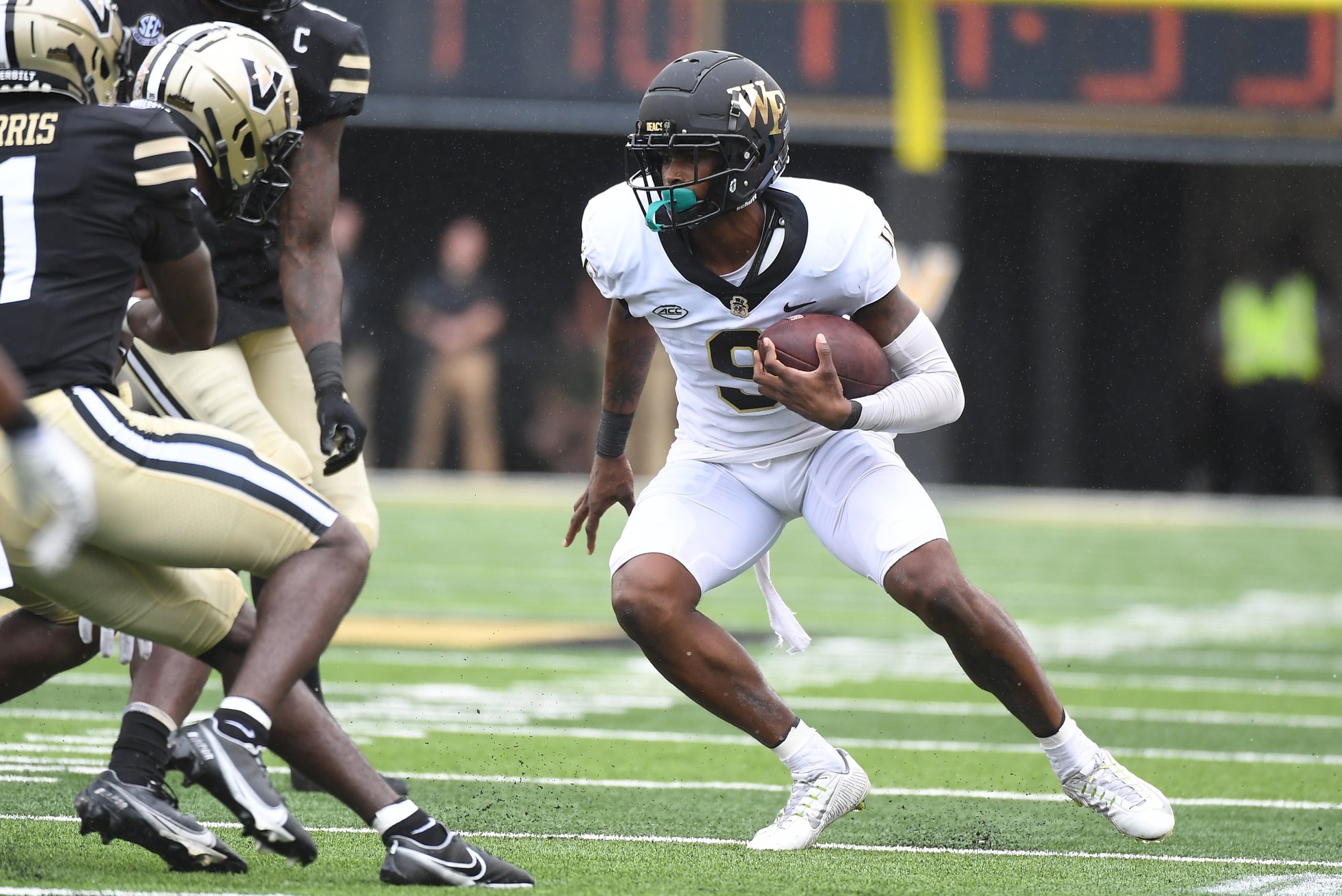 Wake Forest Demon Deacons wide receiver A.T. Perry (9) runs after a reception during the second half against the Vanderbilt Commodores at FirstBank Stadium.