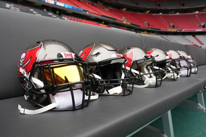 Tampa Bay Buccaneers helmets on the bench before an NFL International Series game at Allianz Arena.